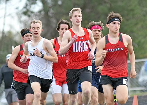 Charlie Evans broke free from a four-wide pack in the final 200 meters to win the 1600 run at Monday’s Central Nebraska Track Championships. 