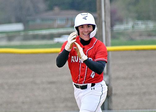 Keegan Chaney celebrates rounding second base after hitting Aurora’s first home run in school history during a 6-5 win over St. Paul/Palmer Thursday. 