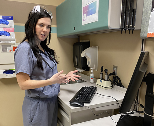 Dr. Jen Harney converses with a patient in a telehealth visit, using online communication which has become a common resource since the pandemic hit.