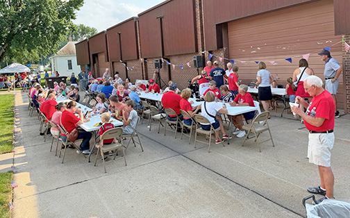 Visitors were treated to a meal served by Aurora High School cheerleaders during their cheer fundraiser that took place alongside the Plainsman’s 50th anniversary.