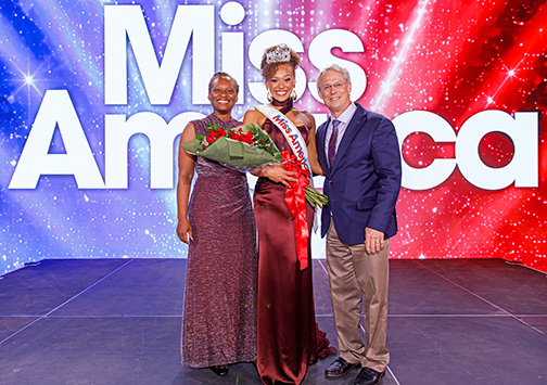 Miss America 2027, Regan Hutsell of Texas, poses for a picture with her parents Romanda and Robert Hutsell after winning the title on Sunday, Sept. 6 in West Palm Beach, Fla. Robert is a 1976 graduate of Hampton High School. 