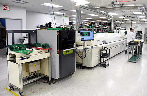 This photo shows some of the new equipment purchased recently at Aurora Boardworks, which uses high-resolution cameras to inspect circuit boards at different stages of production.