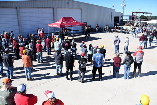 Plant manager Mike Morrow addresses BonnaVilla Homes employees Friday during a luncheon event in recognition of National Manufacturing Month.