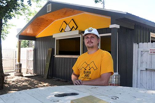 Justin Blase, owner of Banana Rams in Hordville, stands in front of a new beer garden bar which he, his father and brother built during the pandemic shutdown. Bars in the county were allowed to open their doors serving up to 50 percent capacity as of June 22. News-Register/Kurt Johnson