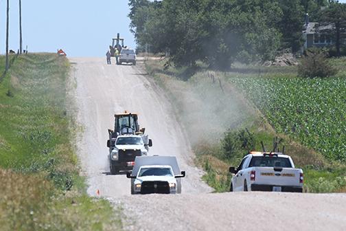 Aurora law enforcement and the fire department were on scene at South S and 12 Roads on June 24 after responding to a call about a broken gas line. News-Register/Jeni Moellenberndt