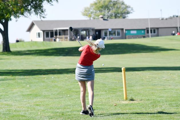 Aurora senior Riley Darbro launches a near-perfect second shot with a hybrid on the 9th hole at Jackrabbit Run in Grand Island during the B-3 district meet last week. 