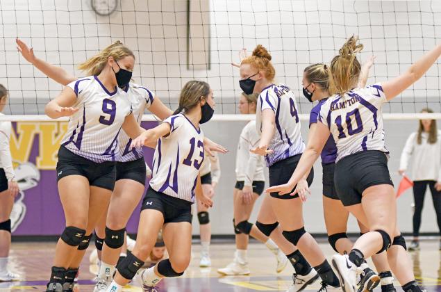 Hampton’s rotation celebrates an ace serve during its win over High Plains Oct. 6. The Lady Hawks had eight of them in the win over the Storm. 