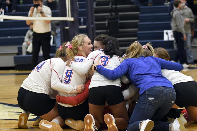 High Plains celebrates after defeating Central Valley in five set, advancing to Saturday's district final.