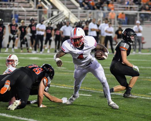 Mack Owens rushed for 155 yards and four touchdowns in Aurora's 55-34 win at Hastings Friday night. 