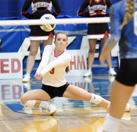 Cassidy Knust receives a serve during Aurora's three-set win over Columbus Lakeview Thursday. 