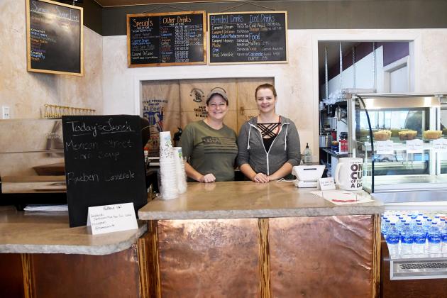 Heidi Walters and her daughter Michaela stand behind the counter of Espression, a business that Heidi began with her mother in 1999.