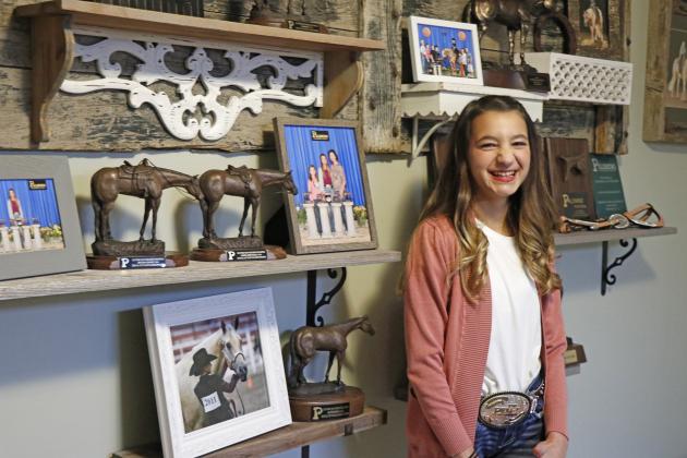 Alexis Ericksen has earned a number of trophies, and one special belt buckle, with four-legged partner Decked All Out in Gold, AKA ‘Decka May.’ She says competing brings her joy. 