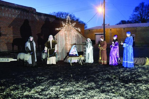 Members of the Cross of Christ Lutheran Church held a live nativity during Come Home to Christmas in lieu of the Night in Bethlahem. Those participating include from left: Eliot Reha, Logan McKay, Jordyn Wells, Joseph Spiehs, Mindy Spiehs, Lizzie Wells and Beth Andrews.