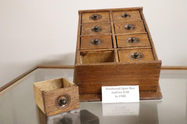 This hardwood spice box on display at the Plainsman is an exact item that could have been found in a 1908 catalog. After being cleaned up by museum volunteer Bob Cool it was put in a case for viewing along with a card noting it was sold for 48 cents.