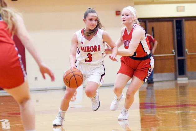 Cassidy Knust led Aurora with 20 points, including six three-pointers during Aurora’s 47-45 win against Omaha Gross Monday. 