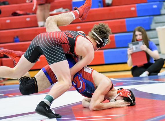 Aurora's Britton Kemling scores a takedown during Aurora's dual against Platteview Friday. 