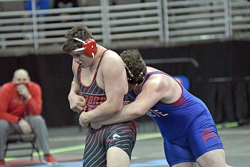 Aaron Jividen was one of five semifinalists for Aurora at the state wrestling championships, eventually finishing 4th at 285. 