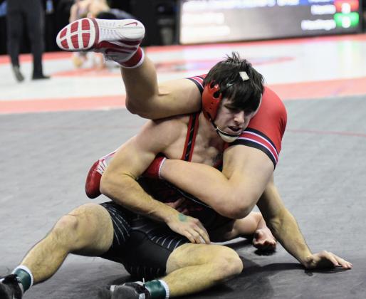 Trevor Kluck won both his matches via tech fall to start the state wrestling championships. 