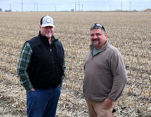 Jeff Reed, left, and Darren Bartunek stand on a 20-acre parcel located on the east edge of Phillips where they have received approval to begin a 56-lot housing subdivision.
