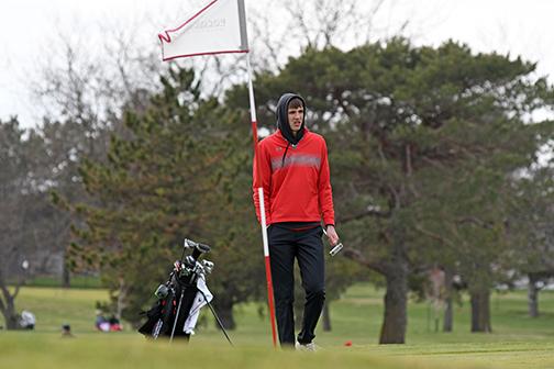 Aurora’s Tate Nachtigal waits for the other players in his group to play just off the No. 7 green at Poco Creek Golf Course March 31. Nachtigal posted a 44 on the course, fifth-best of the day. 