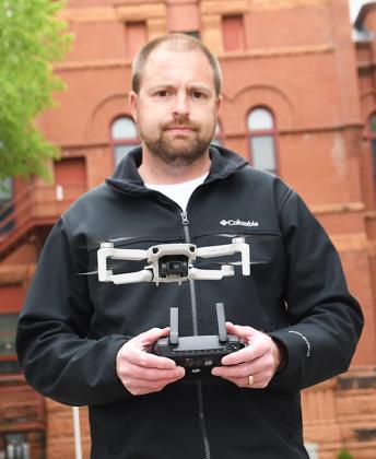 Ben Buller of Hampton flies his DJI drone, which he uses as part of his new aerial photography business.
