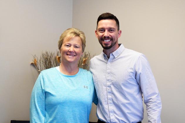 Peg Lackore (left) and Tyler Jensen have been reunited in physical therapy 22 years after she helped him on the road to recovery.