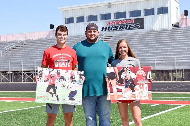 Former Huskies Jameson Herzberg and Cassidy Knust were selected for the Aurora News-Register’s newest honor, the male and female athletes of the year for the 2020-21 season. They are pictured here with ANR sports editor Richard Rhoden.