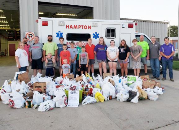 Hampton firefighters and a total of 19 youth volunteers collected 3,355 pounds of food last week as part of a challenge between area fire departments working together to benefit the Hamilton County Food Pantry.