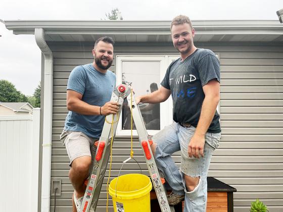 Carson, left, and Cavett Klute combined forces recently to launch a new sideline business they call Clean Gutter Bros., offering gutter cleaning throughout Hamilton County and beyond.