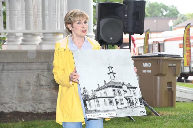Pippa White shared the story of how the previous Hamilton County Courthouse was burned, prompting construction of the existing structure in 1895.