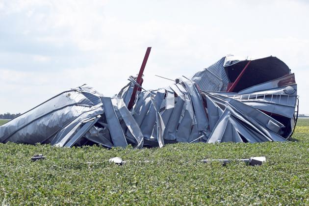 Grain bins were not exempt from Friday night’s high wind storm that left plenty of damage behind. Heavy damage was sustained to the grain bins at the intersection of Highway 14 and 6 Road south of Aurora. 