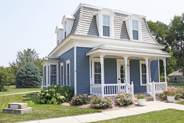 The exterior of the Bates House is now a pleasant shade of blue, which is more historically accurate to the Victorian era. It also showcases a brand new roof and windows.
