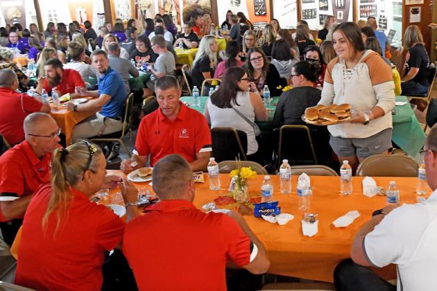 Staff members from Aurora, Giltner, Hampton and Hampton Lutheran gathered for a luncheon Monday afternoon where they were served by a group of students from the four schools.