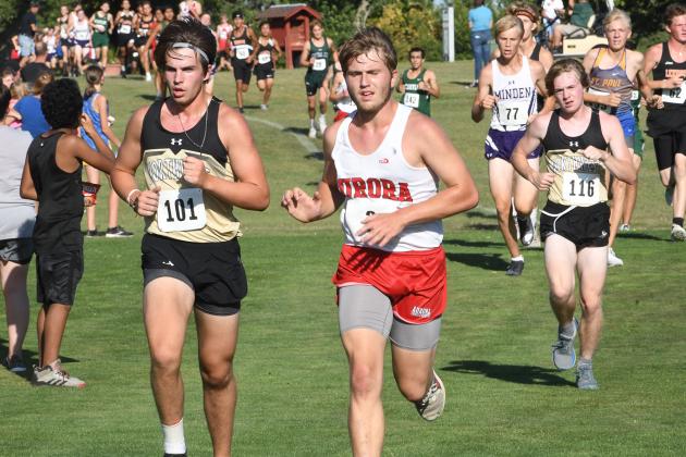 Aurora senior Mitch Breuer broke 20 minutes for the first time in his high school career a week ago, then shaved almost a full minute off his PR at Central City with a 19:05 finish.