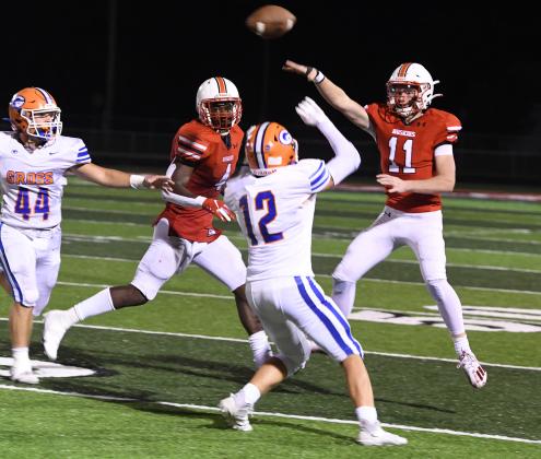Junior quarterback Drew Knust tosses a pass during the late going of Friday’s home win over Omaha Gross. He completed 8 of 14 passes for 83 yards.