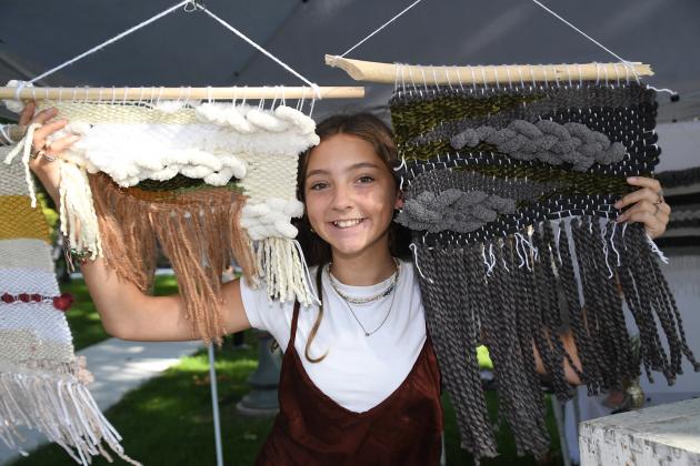Annaston John was the youngest participant in this year’s Aurora Art Walk. At the age of 12, the Hampton middle school student displayed her weaving talents.