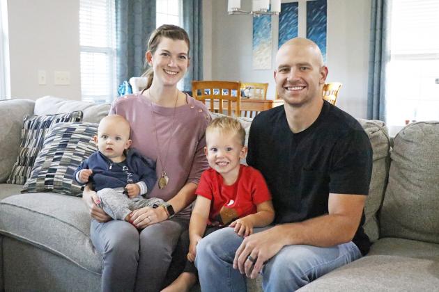 The Erbst family has been through a lot over the past year, but is ready for a clean start. The family includes mom Dr. Alexis Erbst holding baby Casey, and dad Tate Erbst with son Cainan.