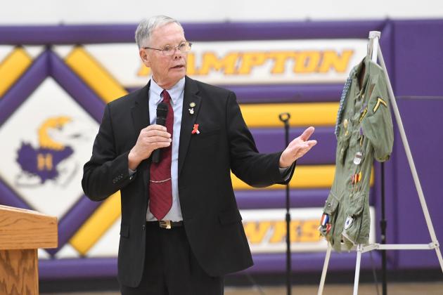 Marlin Seeman shared a message focused on “family” during his Veterans Day program in Hampton, where he taught for 34 years.