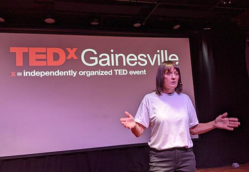 Mary Ingram of Phillips is shown speaking on a TED stage this June in Gainsville, Fla. Her message challenges her audience to put a more positive light on community service as a useful tool for young people.