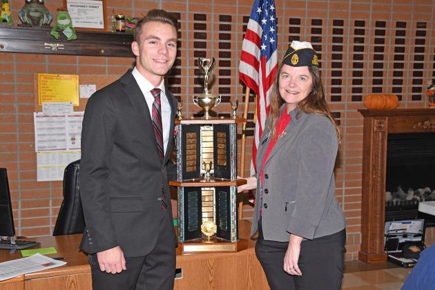 Jeremy Hunter, left, a senior at Aurora High School, was honored last week by the American Legion Post 42 in Aurora for having won the Dist. 6 American Legion oratorical contest Nov. 5.