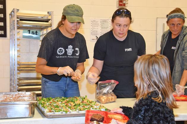 Brittany Lozdoski, left, and Denise Bone combined efforts to offer Aurora elementary students a farm-to-school taste test.