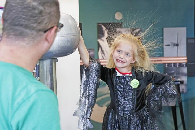 Rowan Sabata, dressed as a spooky witch, had an electrifying experience during the Edgerton Spooktacular Saturday afternoon. Trying out the Frankenstein Experience, better known as the Van de Graaff generator, had her hair standing on end.