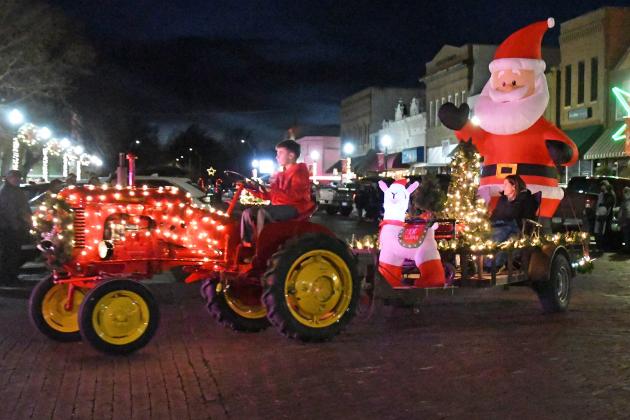Landen Rojewski entered this lighted tractor in Saturday’s parade, one of 15 entries in this year’s Come Home to Christmas finale. The 1951 Massey Harris Pony was restored by Landen’s grandfather, Kent Tucker.