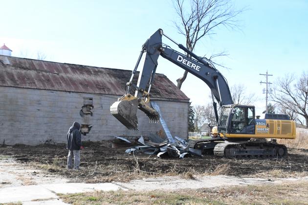 A demolition crew cleared this lot, then tore down the building pictured next to it, making way for a new bar and grill expected to open on Main Street in Phillips by next spring.