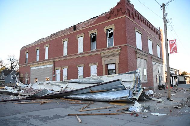 The roof of the Robertshaw Insurance Agency building in Giltner was blown to the ground during last week’s storm, temporarily blocking the city street below.