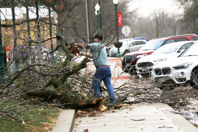Cleanup crews were out almost immediately following the storm Dec. 15 for clean up efforts, shown here on the courthouse square.