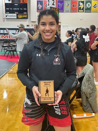 Courtesy photo // Aurora sophomore Kehlanee Bengtson shows off her plaque that she received for being named the Outstanding Wrestler at Friday’s 10-team Lexington Invitational. Bengston went 4-0 on the day, all by pins.