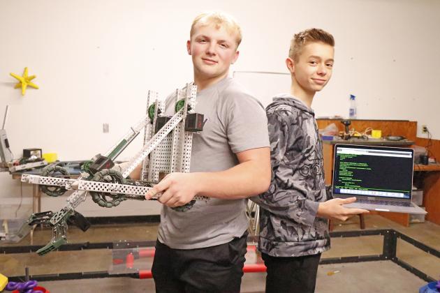 Evan Pankoke, left, and Grant Ferguson are among many Hawks who are working with and learning about technology through various classes at Hampton High School.