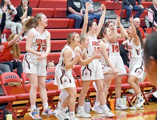 Aurora’s bench went bonkers after Rylee Olsen sank the game-winning three-point shot in Saturday’s win over Lexington. 