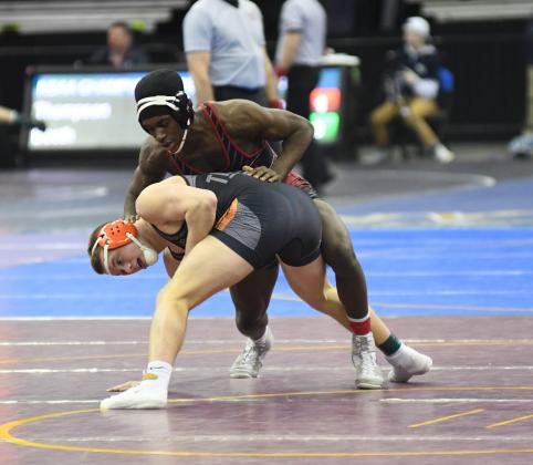 Mack Owens is one of three semifinalists for the Huskies at the Class B state wrestling championships. 